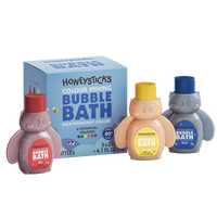 Honeysticks bubble bath bottles with a color mixing kit on a white background
