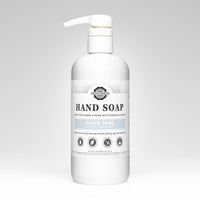 Hand soap bottle with pump on a gray background