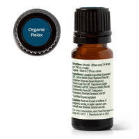 Small amber glass bottle with a black cap labeled 'Organic Relax' on a white background.