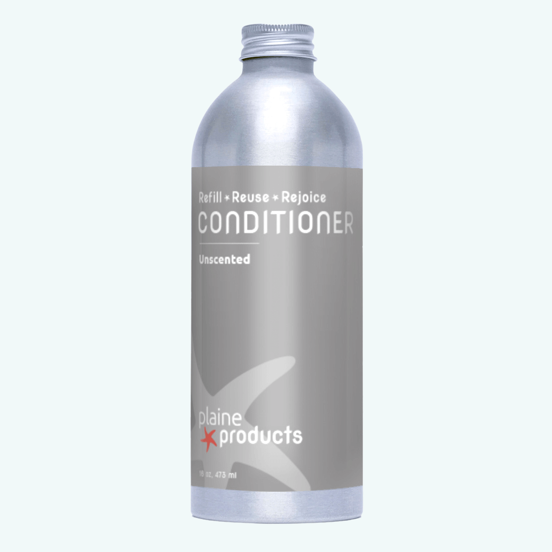 Silver conditioner bottle with 'plaine products' branding on a white background Main image
