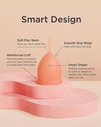Menstrual cup with labeled features on a beige background