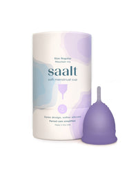 Purple menstrual cup with packaging labeled 'saalt' on a white background