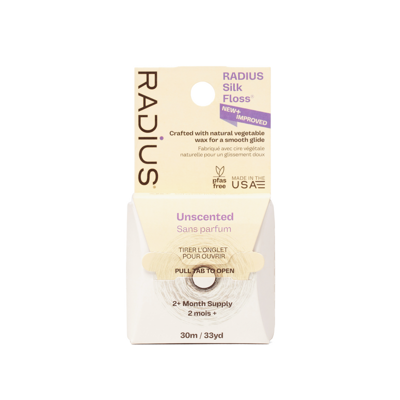 Radius Silk Floss Unscented wax taper box, 30m/33yd supply, with a cream and white design and purple text accents.
