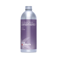 Bottle of plaine products conditioner on a white background