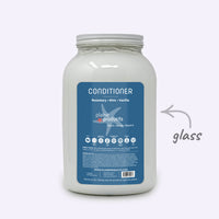Large container of conditioner with a blue label on a white background