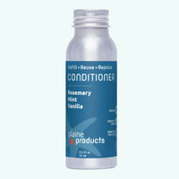 Bottle of plaine products conditioner on a white background