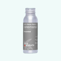 Plaine Products conditioner bottle on a white background