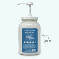 White conditioner bottle with pump and blue label on a white background
