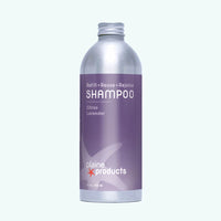 Plaine Products shampoo bottle with purple label on a white background