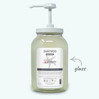 Plaine Products shampoo bottle with pump on a white background